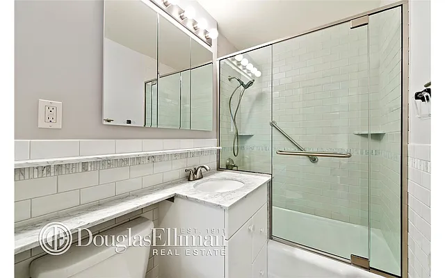 Sold by Douglas Elliman | media 11