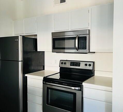 4th image of 5345 E Van Buren St Unit 112