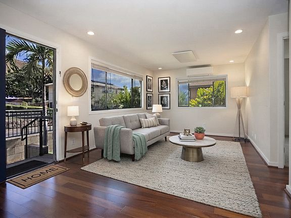 *Virtually Staged* Spacious Living Room with Wood Flooring and Split AC Unit! (1st Floor)
