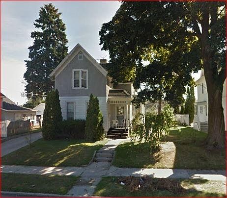 Front of house with side yard