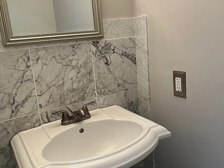 Convenient restroom in the entry foyer