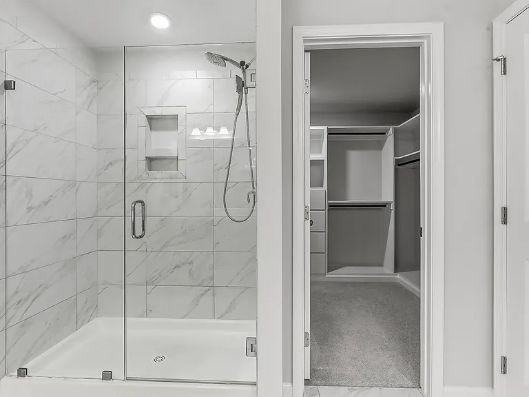 Primary Shower and Walk in Closet