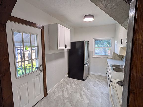 Front door and Kitchen