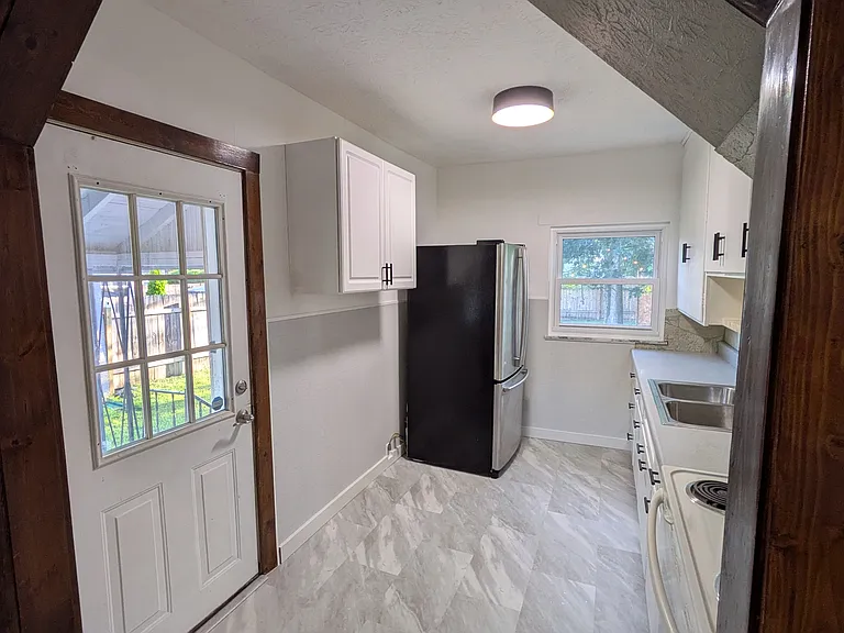 Front door and Kitchen