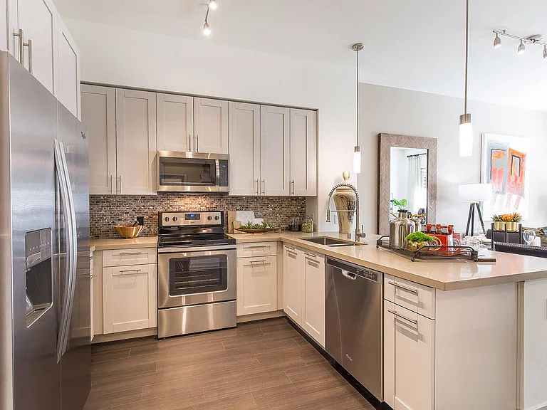Designer custom cabinetry and spacious kitchen islands