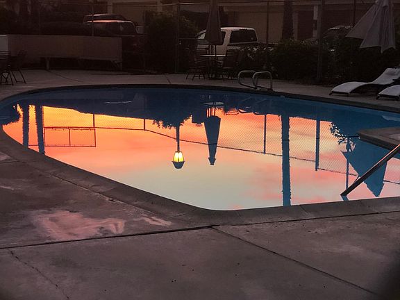 There is a pool, tennis court and basketball court.