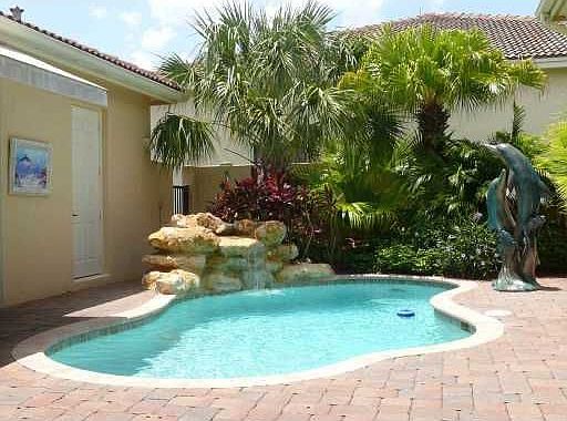 Gorgeous Courtyard Style Home