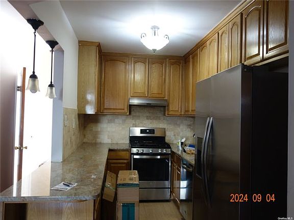 2nd image of 52-83 72nd Pl Unit 1