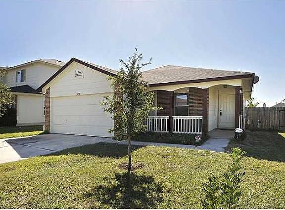 Front of house including side yard