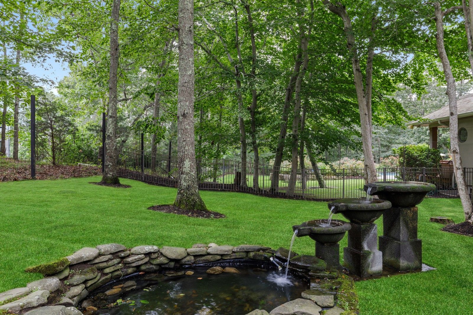  CALMING WATER FEATURE WITH FISH POND