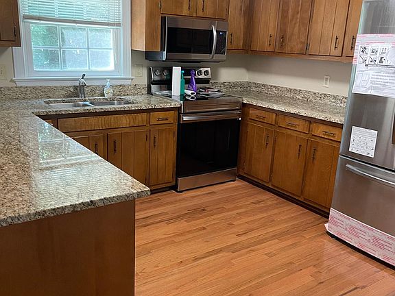 Kitchen with stainless steel appliances.