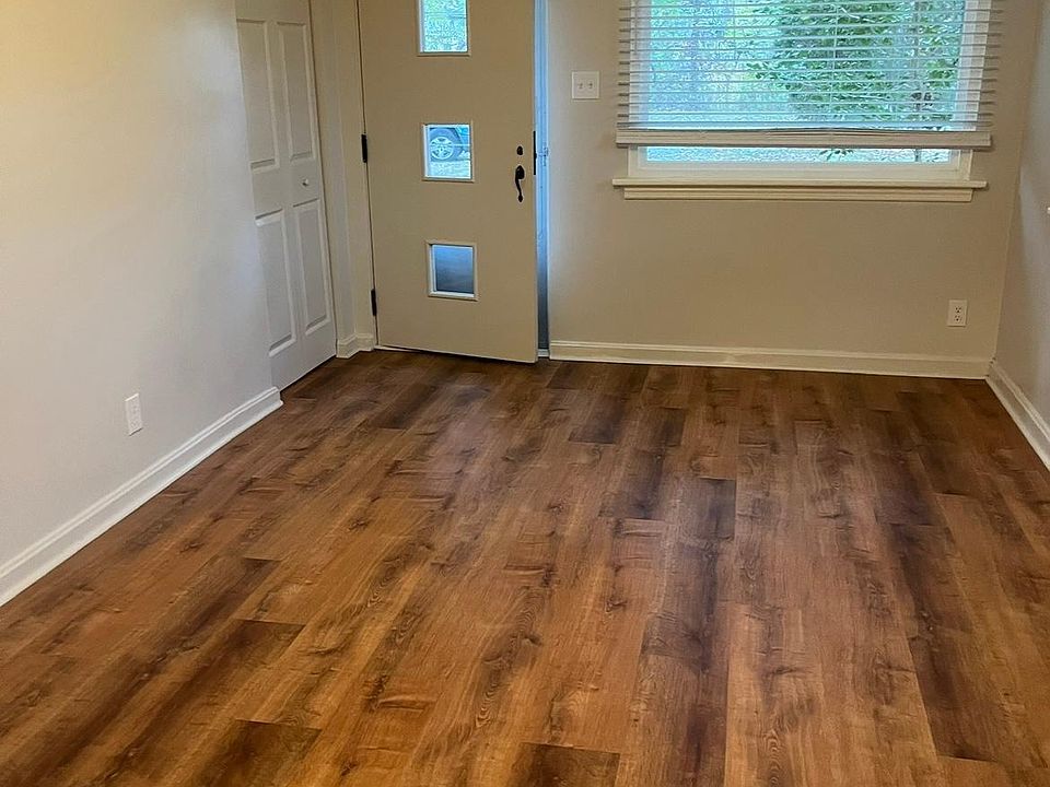Living room facing out to front door. 10'+ wide by 19' deep.