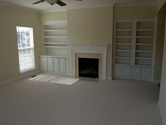 This 16X18 Great Rm Features Gas Fireplace surounded by Built-in