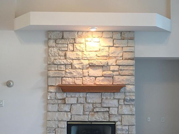 Stone natural gas fireplace