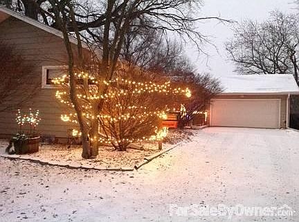 Two Car Heated Garage
						:
						Driveway view