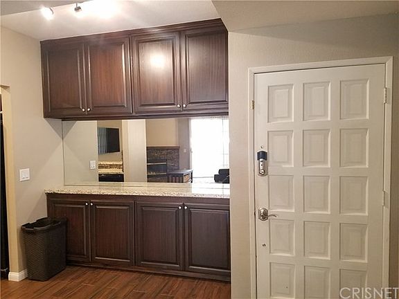 Dining area off kitchen with custom cabinetry
