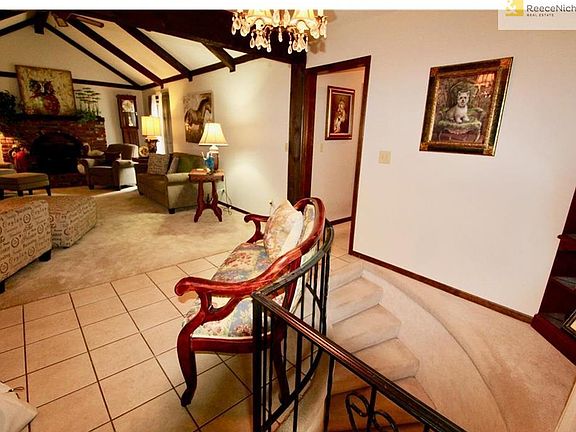 Foyer with curved staircase