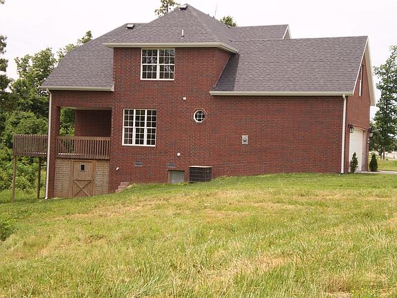 Side view of the all break house showing the decking and John Deere rom