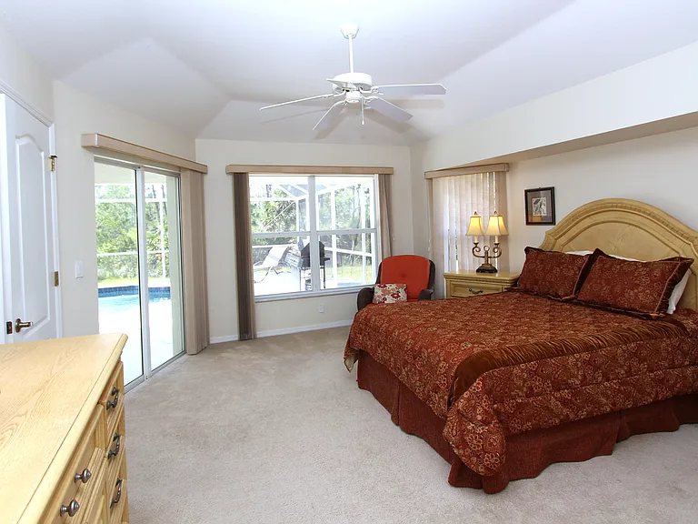 Master Bedroom - view 1 Overlooking Pool_11182023