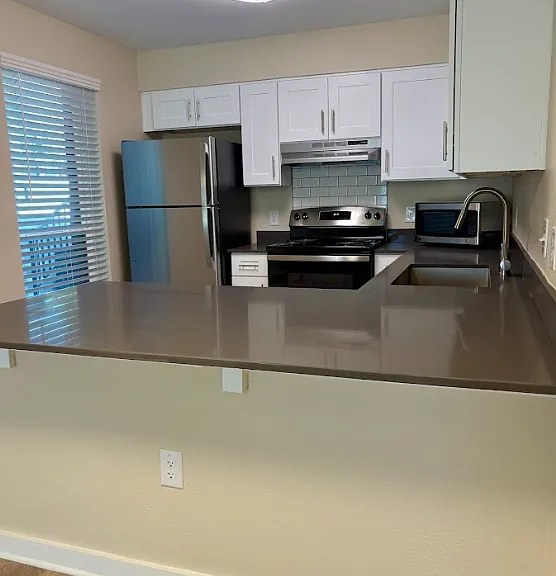 Brand New Construction Building with quartz countertops, stainless steel appliances and top of the line finishes.