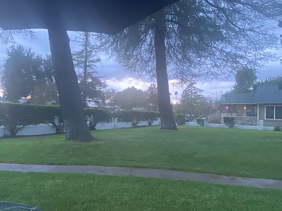 This is a view of the front yard of the main home, which the cottage is behind. While this view is not viewable from the cottage, the scene provides you a sense of the beauty of the property the cottage is on.