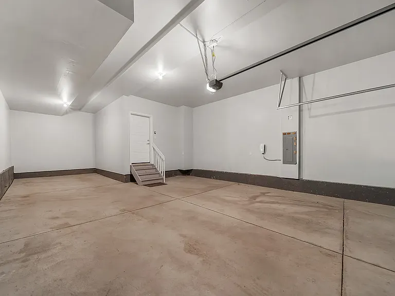 3 car garage with Tesla EV charger