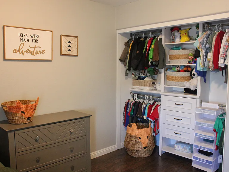 Built-in closet with shelving and storage