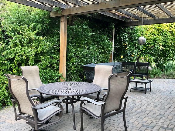 Dine al fresco with resident hummingbirds