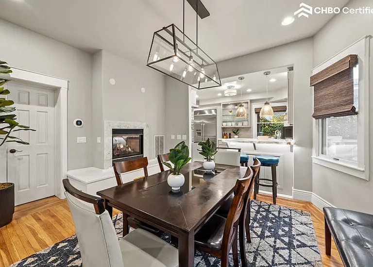 Dining room toward kitchen & fireplace