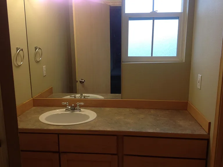 bath room by 2nd larger bed room
