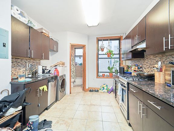 3rd image of 501 1/2 W 43rd St APT 2E