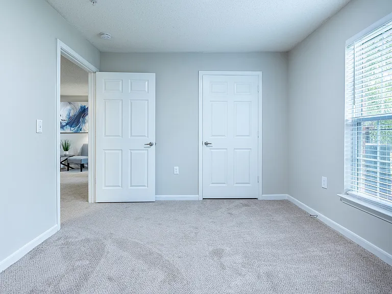 Bedroom with carpet