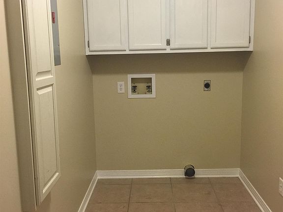 Laundry Room w/ a Iron-A-Way ironing center