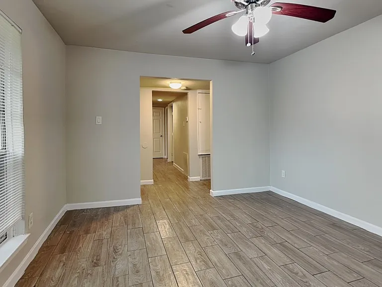 Spacious bedroom with neutral