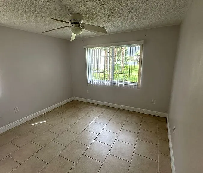 5005 Wiles Rd #102 — Photo 29