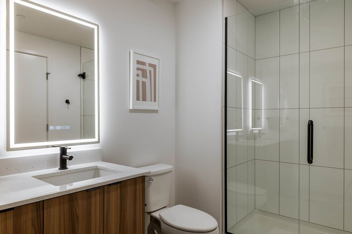 Designer bathroom with walk-in shower