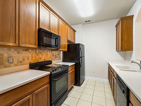 4th image of 3332 Robert Trent Jones Dr Unit 303