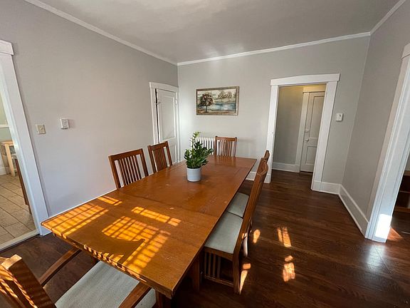 Dining room seats 8 (additional matching chairs not in photo)