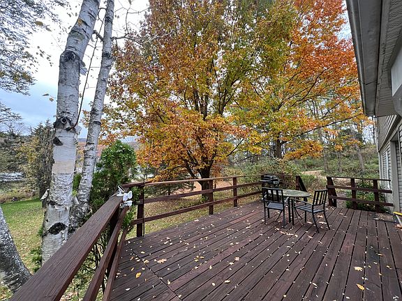 Relaxing front deck with valley views.
