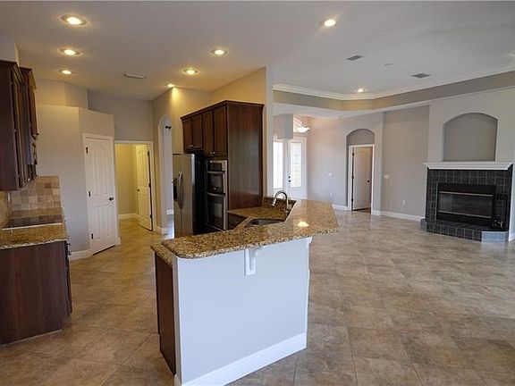 Kitchen / Family Room w/Wood Burning Fireplace.