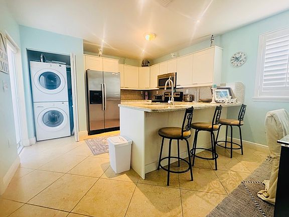 Kitchen with washer/dryer