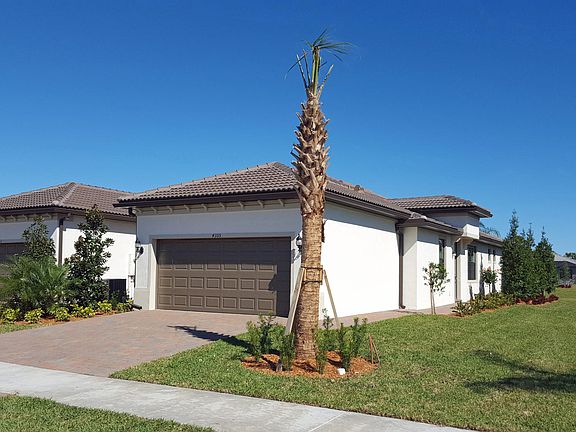 Villa Street View with 2 car Garage Side entrance