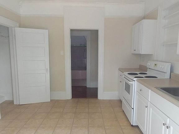 Large eat in kitchen with pantry, closet, storage.