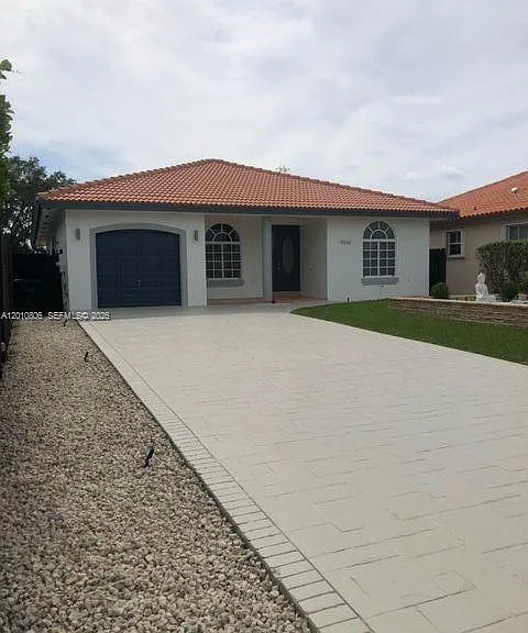 9910 SW 23rd St — Photo 1