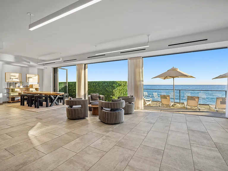 Gather with friends in the open living area, designed for shared moments.