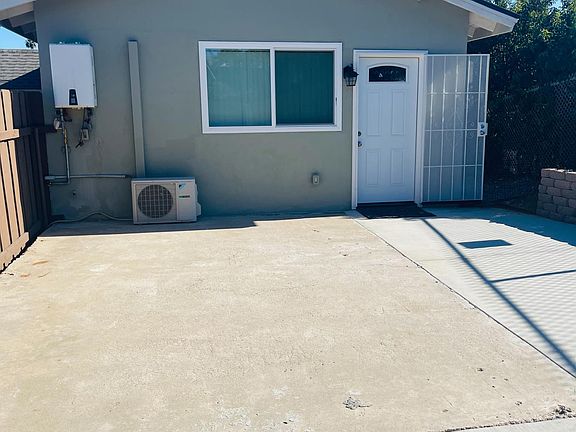 Front door to granny flat with security screen door