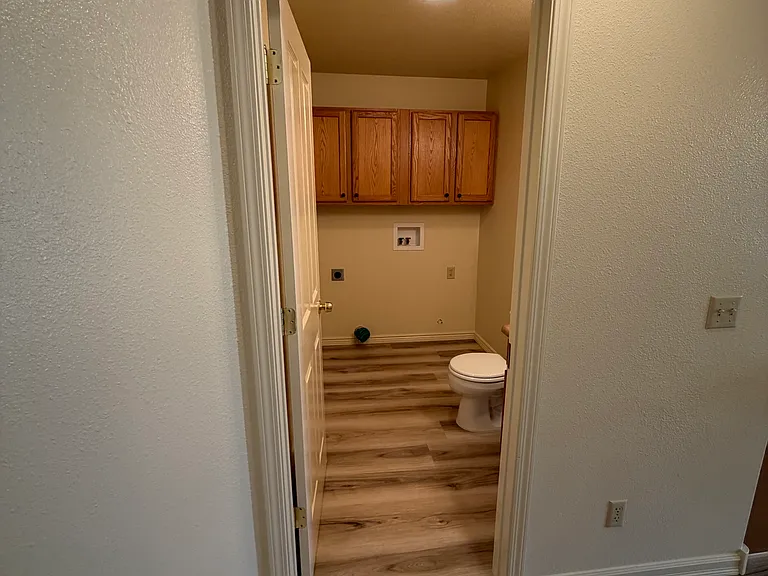Laundry room and half bath.
