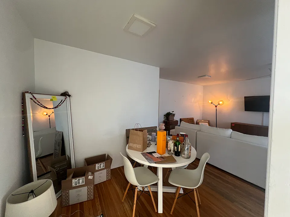 Dining room from kitchen towards living room.