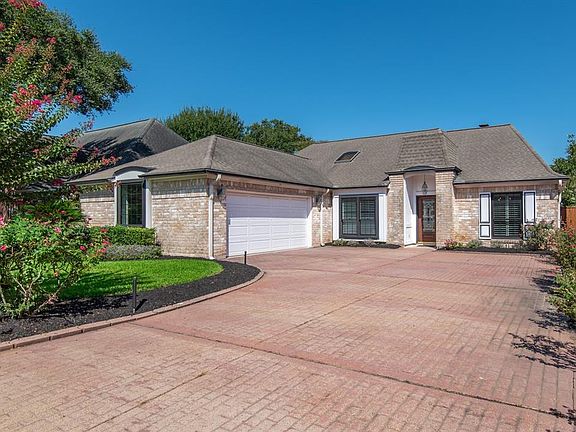 An impressive front elevation with lush landscape, oversized two-car garage and double wide driveway with plenty of room for guest parking!