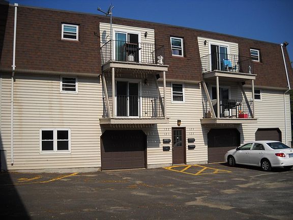 back of unit and parking